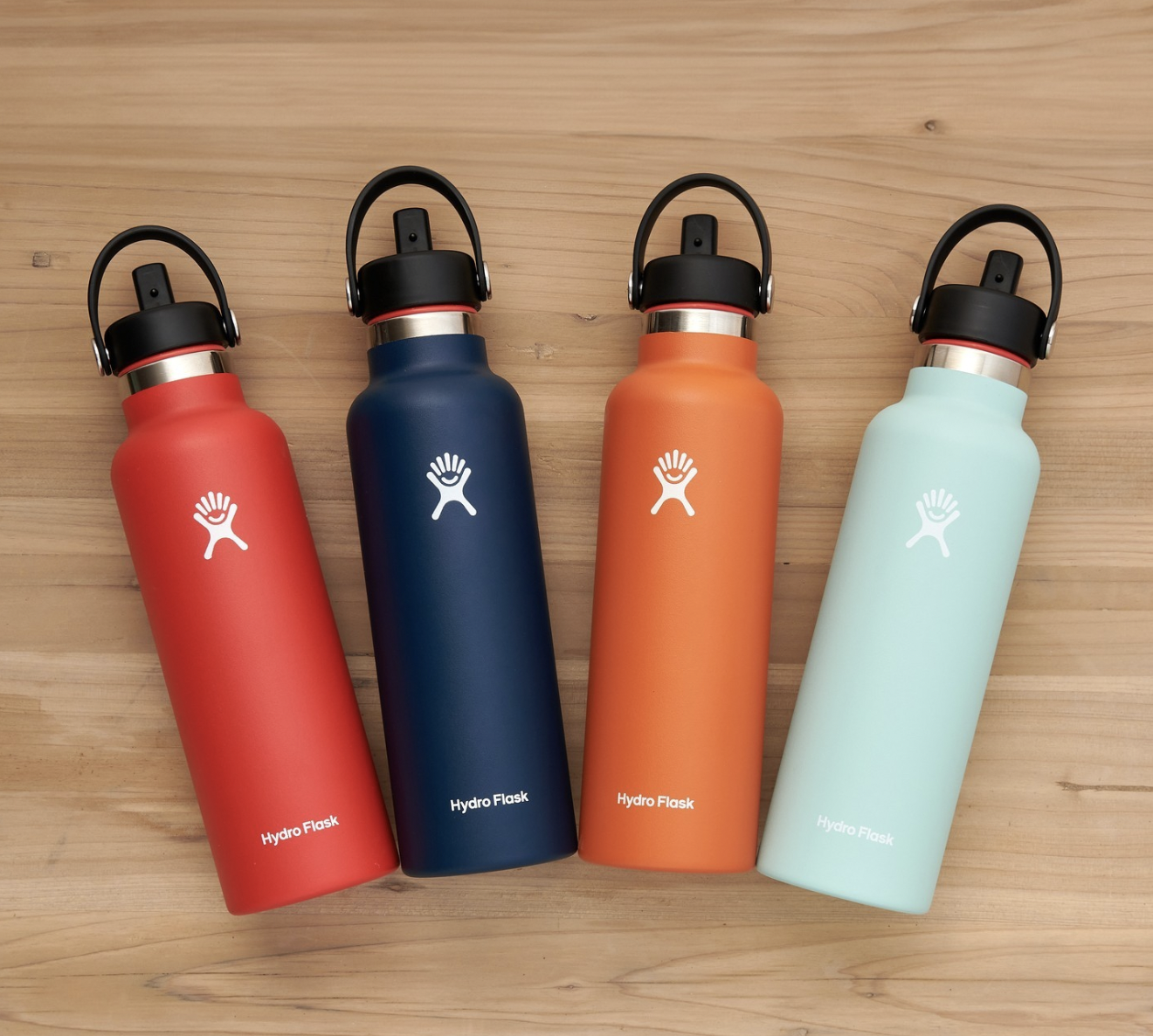 An assortment of custom branded Hydro Flask bottles by Swagger.