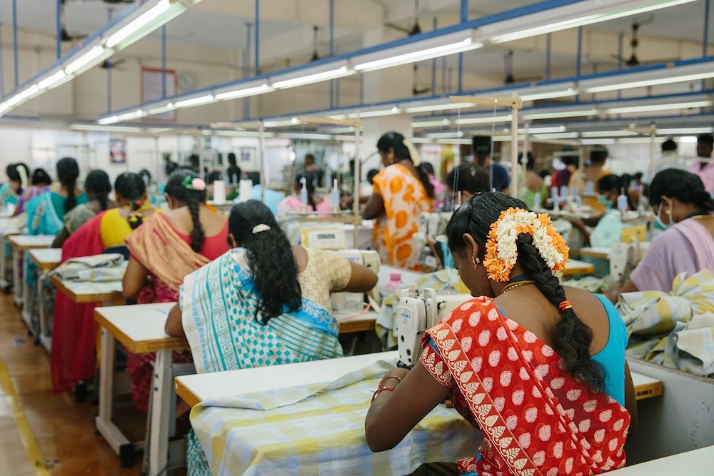 Garment workers in a Known Supply warehouse in India.