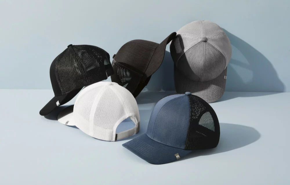TravisMathew's signature performance golf hats, styled by Swagger.