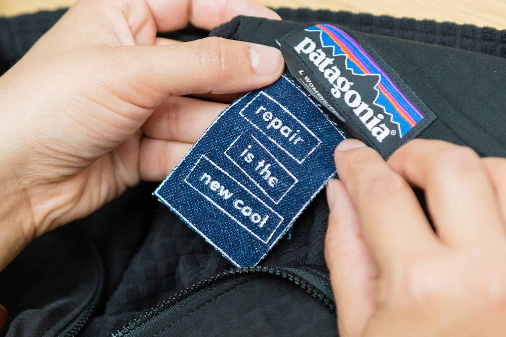 A tag on a Patagonia jacket that has been repaired through the Worn Wear program by Patagonia.