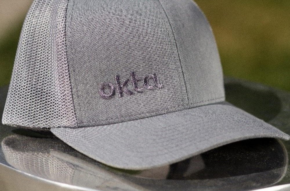 Custom branded Okta hat curated and designed by Swagger