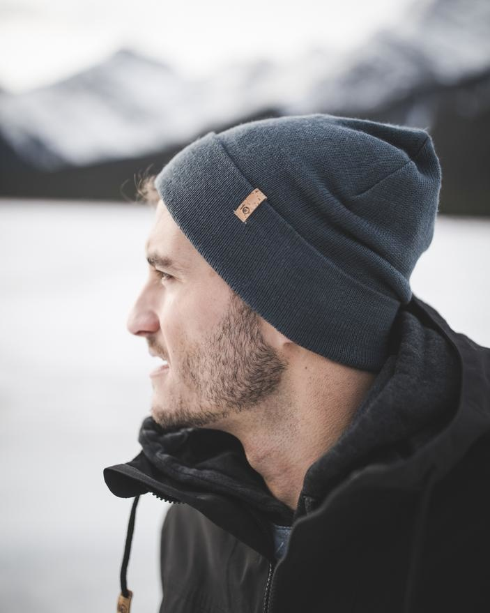 Man wearing a custom branded Tentree beanie by Swagger.